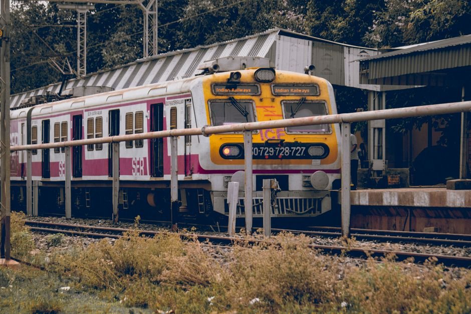 Jalandhar Cantt Station Amenities Restored After PM Modi’s Inaugural Event Front view of an Indian train at a railway station platform surrounded by greenery and infrastructure.