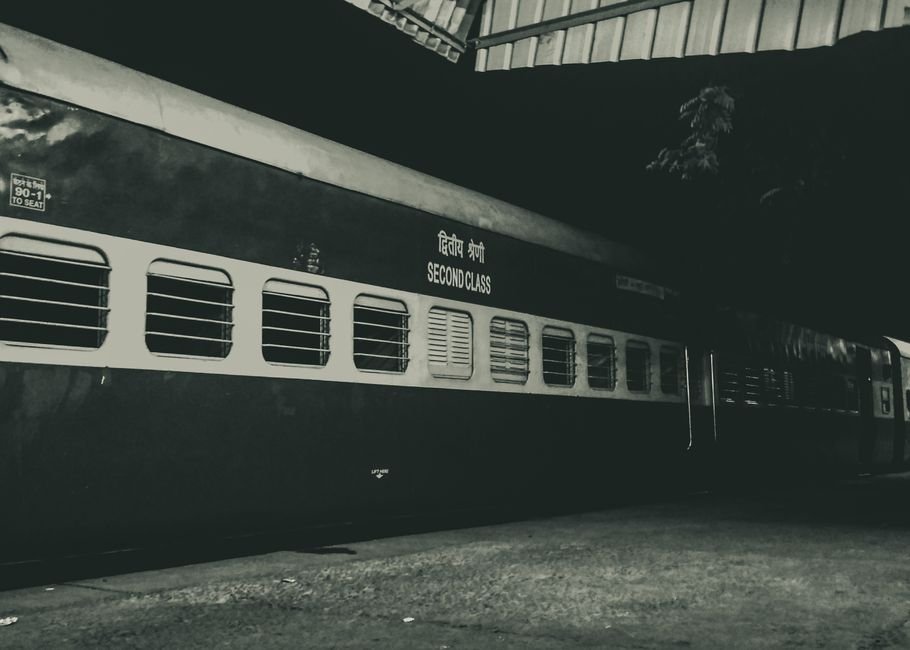 Andhra Pradesh: Rayanapadu Railway Station Set for Inauguration on July 17 Following ₹35 Crore Upgrade Night photo of a second class train parked outdoors under a station roof.