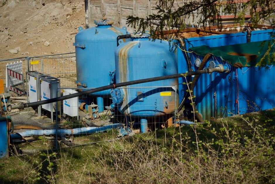 Shivamogga Faces Water Shortage as Repair Work Halts Treatment Plant Operations Outdoor industrial water filtration plant with large blue tanks under sunlight.