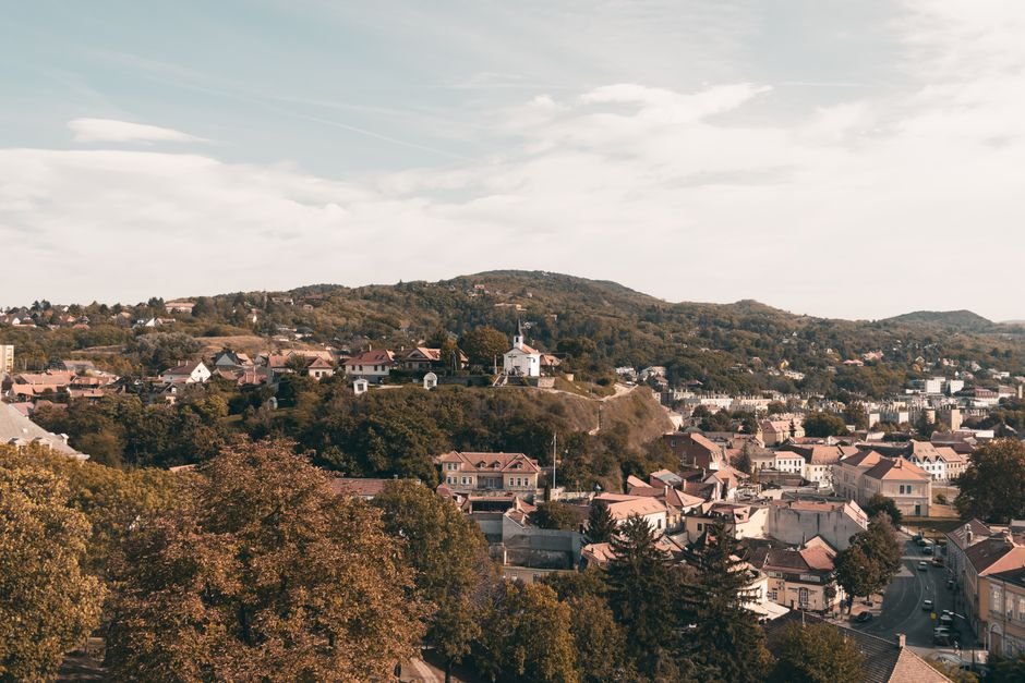 Jammu and Kashmir: Flash Floods Trigger Landslide in Poonch, Casualties Feared Scenic aerial view of Esztergom, Hungary with charming houses and autumn foliage.