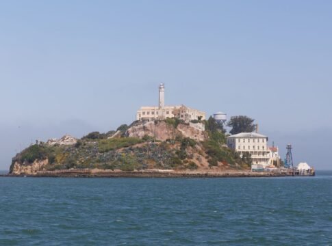 Scenic view of Alcatraz Island featuring the historic lighthouse in San Francisco. Scenic view of Alcatraz Island featuring the historic lighthouse in San Francisco.