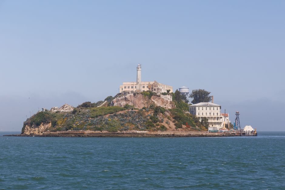 One Dead, Two Missing After Boat Sinks Near Alcatraz Island Scenic view of Alcatraz Island featuring the historic lighthouse in San Francisco.