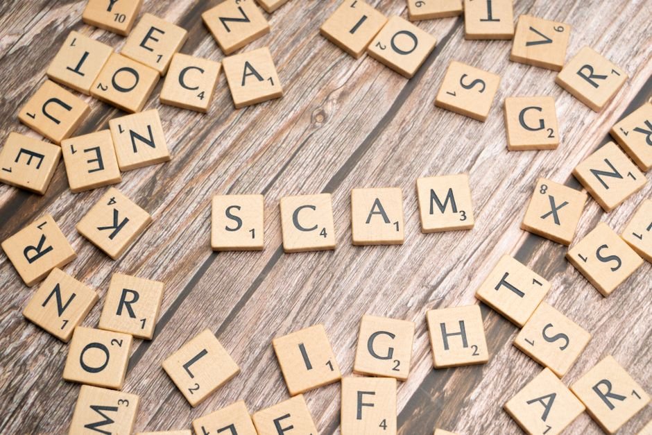 Madras High Court Directs Three-Month Trial Completion for 2016 Gutkha Scam Scrabble tiles on a wooden background spell out the word 'scam', concept for deception and trickery.