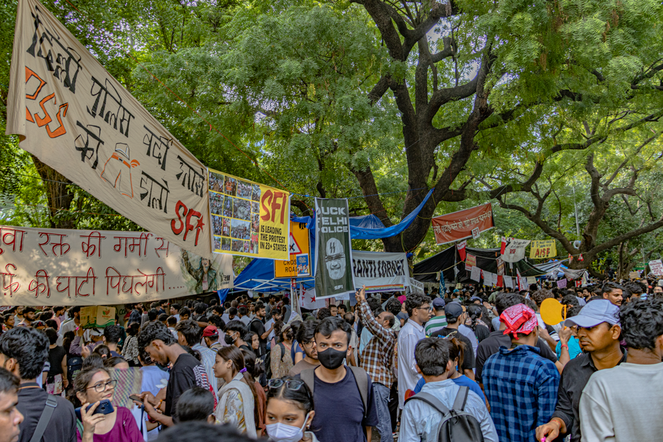 Farooq Abdullah Warns of Escalated Protests if Promises to Jantar Mantar Agitators Unmet Students gather in New Delhi for a peaceful protest, displaying banners and signs at Jantar Mantar.