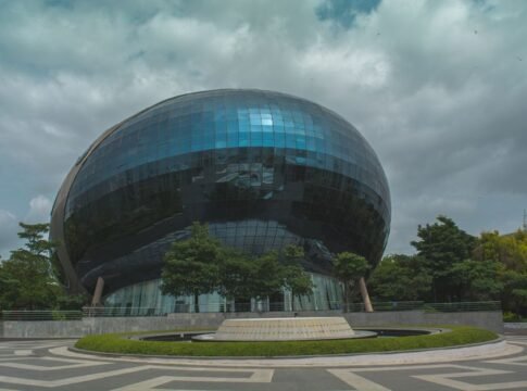 Stunning modern architecture in Pimpri-Chinchwad, Maharashtra, India featuring reflective glass facade.