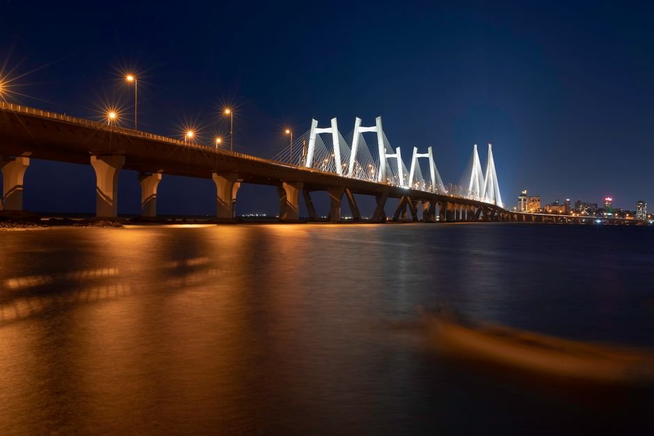Mumbai’s Sewri-Worli Connector to Miss September Deadline, Likely Opening Early 2027 Stunning view of the illuminated Bandra-Worli Sea Link in Mumbai at night.