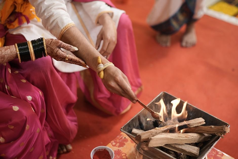 Delhi Police Receive Complaint Against Free Food Distributor Mohammad Junaid from Protest Volunteer A Hindu bride and groom participate in a sacred fire ceremony, symbolizing eternal unity.
