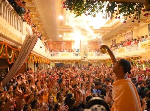 A lively celebration inside a Jaipur temple showcasing Indian culture and traditions. A lively celebration inside a Jaipur temple showcasing Indian culture and traditions.