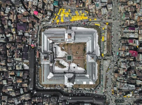 A stunning aerial photograph of Srinagar showcasing a central landmark amidst urban sprawl.