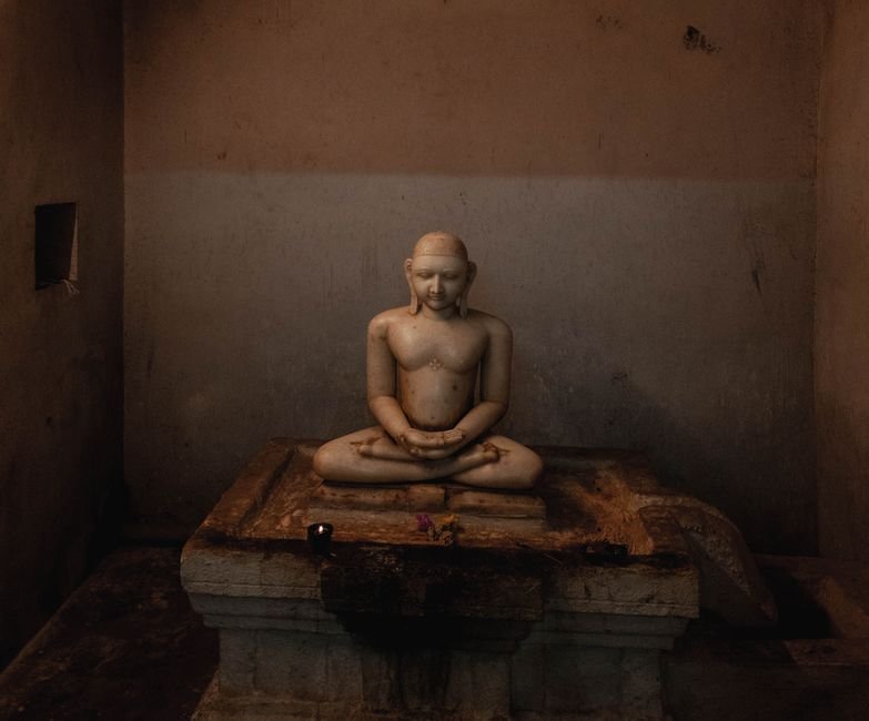 Ladakh DGP Urges Coordinated Approach for Border Security A tranquil marble statue in a dimly lit temple in Kanchipuram, India, exuding calmness.