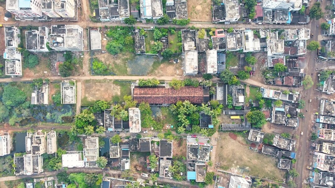 Andhra Pradesh MLA Anam Venkata Ramana Reddy Focuses on Constituency Infrastructure Aerial view of Siddhartha school and its vicinity in Tangellamudi, Eluru