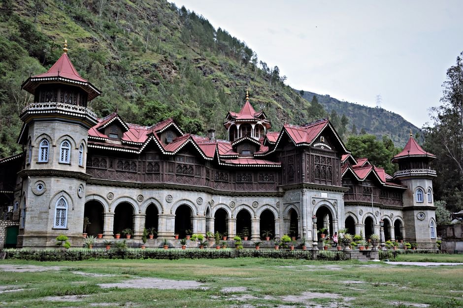 Himachal Pradesh University Vice-Chancellor Ends ABVP Hunger Strike After Fee Hike Rollback Architectural marvel of Padam Palace amidst lush greenery in Himachal Pradesh.