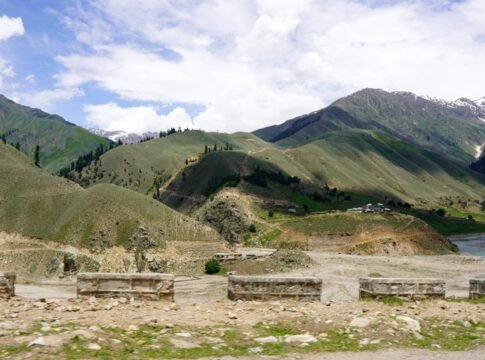 Breathtaking view of Naran Valley's lush hills and river in summer. Breathtaking view of Naran Valley's lush hills and river in summer.