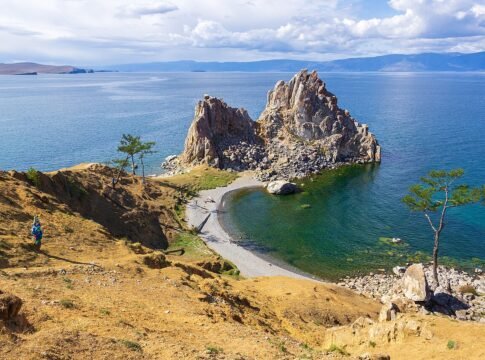 Cape Burhan with Shaman Rock, Shamanka Rock. The rock formation is made of white marble, dolomite, limestone, with inclusions of garnet, quartz and graphite. It is of great importance in the history … Cape Burhan with Shaman Rock, Shamanka Rock. The rock formation is made of white marble, dolomite, limestone, with inclusions of garnet, quartz and graphite. It is of great importance in the history …
