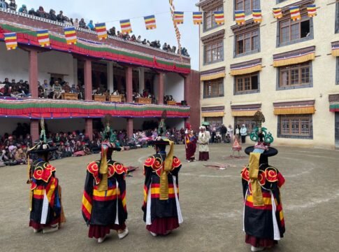 Colorful masked dance performance at the Hemis Festival in a courtyard in India. Colorful masked dance performance at the Hemis Festival in a courtyard in India.