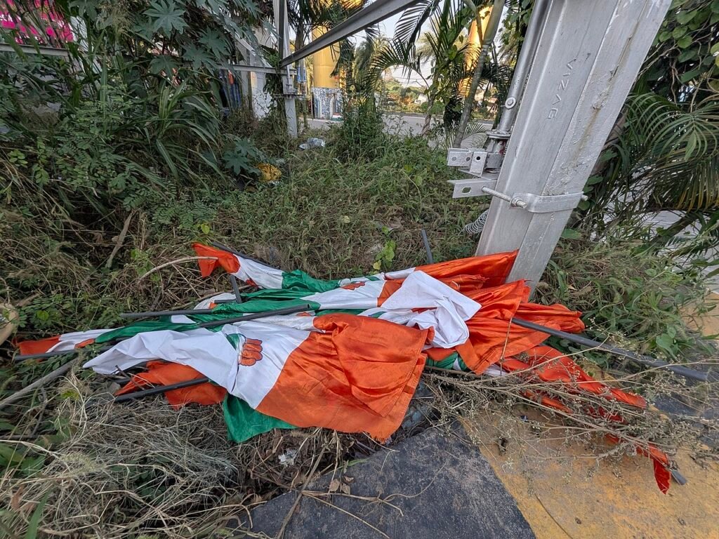 Discarded flags of India National Congress, near Golden Charminar