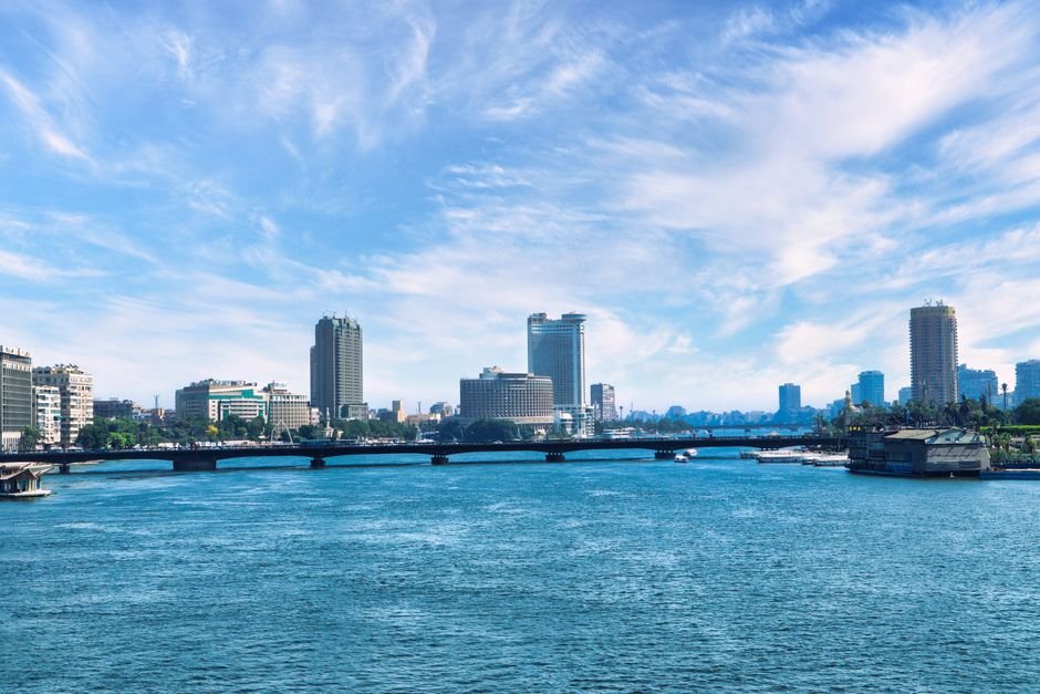 UN Seeks Assistant Data Specialist for Cairo Regional Office Amid Project Appointment Discover the stunning Cairo skyline with the serene Nile River and a clear blue sky backdrop.