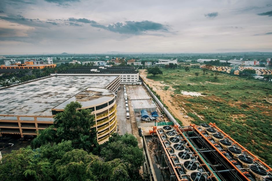 Jammu and Kashmir: Rs 104 Crore Plug-and-Play Industrial Park Planned for Srinagar’s Nowgam Industrial complex with adjacent greenery, highlighting cityscape and infrastructure.