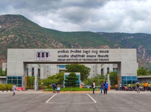 Main entrance of Indian Institute of Technology Tirupati with scenic mountains in background.