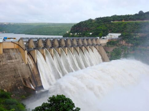 Majestic view of water flowing over Srisailam Dam in Andhra Pradesh, India. Majestic view of water flowing over Srisailam Dam in Andhra Pradesh, India.