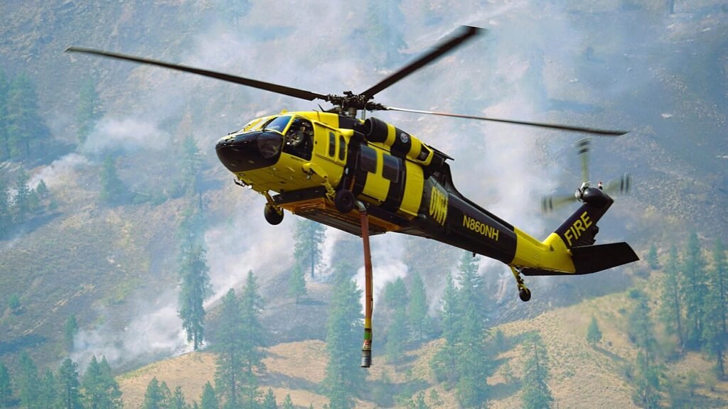 Northwest Helicopters Sikorsky UH-60A Black Hawk firefighting helicopter, "Bumblebee" working with the incident team fighting the Sinlahekin Fire,