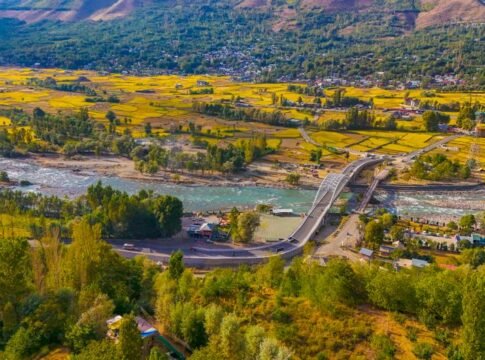 Scenic aerial view of the vibrant Ganderbal Valley and Wayil Bridge in Kashmir. Scenic aerial view of the vibrant Ganderbal Valley and Wayil Bridge in Kashmir.
