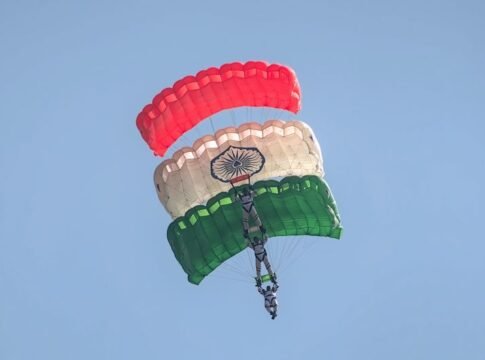 Skydivers displaying Indian flag colors in an aerial stunt in Bengaluru.