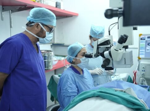 Surgeons performing eye surgery in a New Delhi hospital operating room. Surgeons performing eye surgery in a New Delhi hospital operating room.