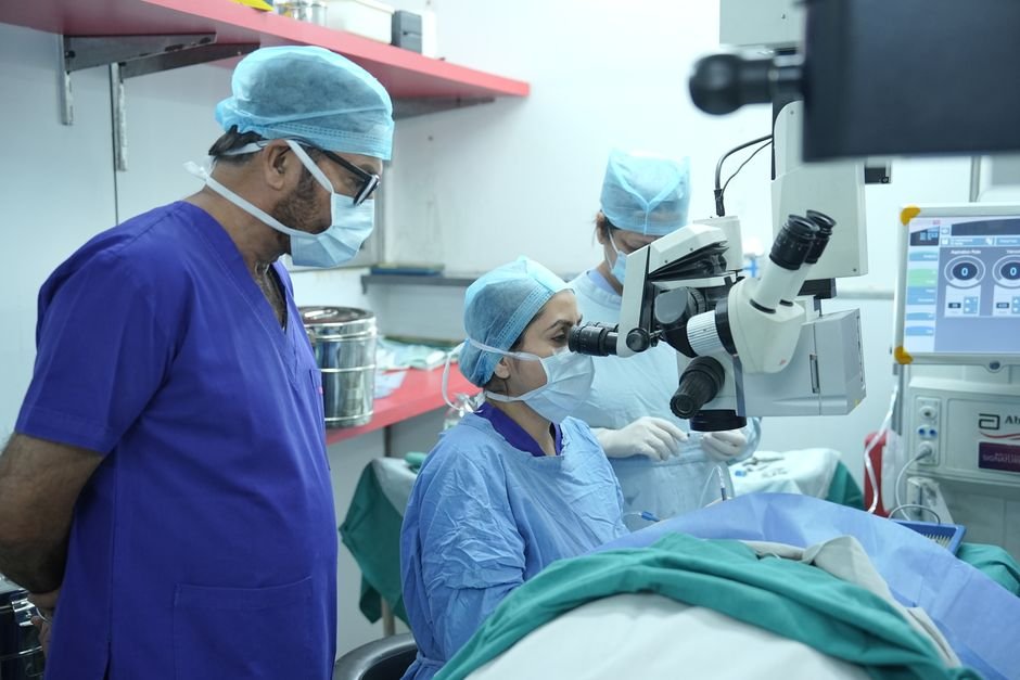 Delhi Medical Council Streamlines Doctor Registration, Eases Relocation Processes Surgeons performing eye surgery in a New Delhi hospital operating room.