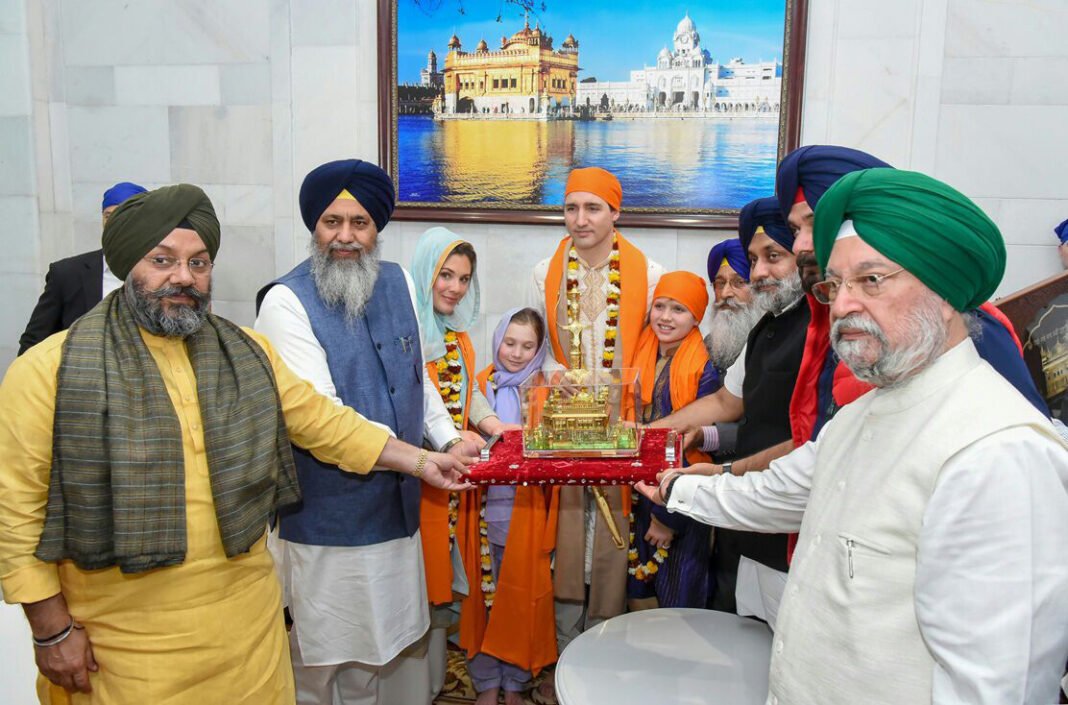Amritsar Police Register Case Against GTC Network Over Gurbani Telecast Dispute The Prime Minister of Canada, Mr. Justin Trudeau being honoured by Sardar Gobind Singh Longowal, President of Shiromani Gurdwara Prabandhak Committee (SGPC), during his visit to Golden Temple, in Amr…