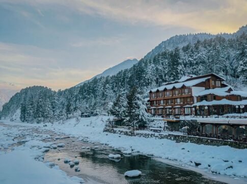 A beautiful winter scene of Pahalgam, Kashmir with snow-covered landscapes and serene river view. A beautiful winter scene of Pahalgam, Kashmir with snow-covered landscapes and serene river view.