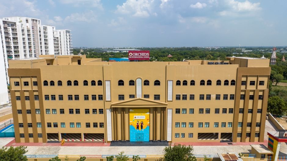 Delhi Art Festival Explores City as a Learning Landscape Aerial view of a modern educational building, Orchids The International School, in India.