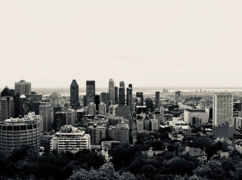 Black and white view of Montréal's iconic skyline with skyscrapers and urban landscape. Black and white view of Montréal's iconic skyline with skyscrapers and urban landscape.