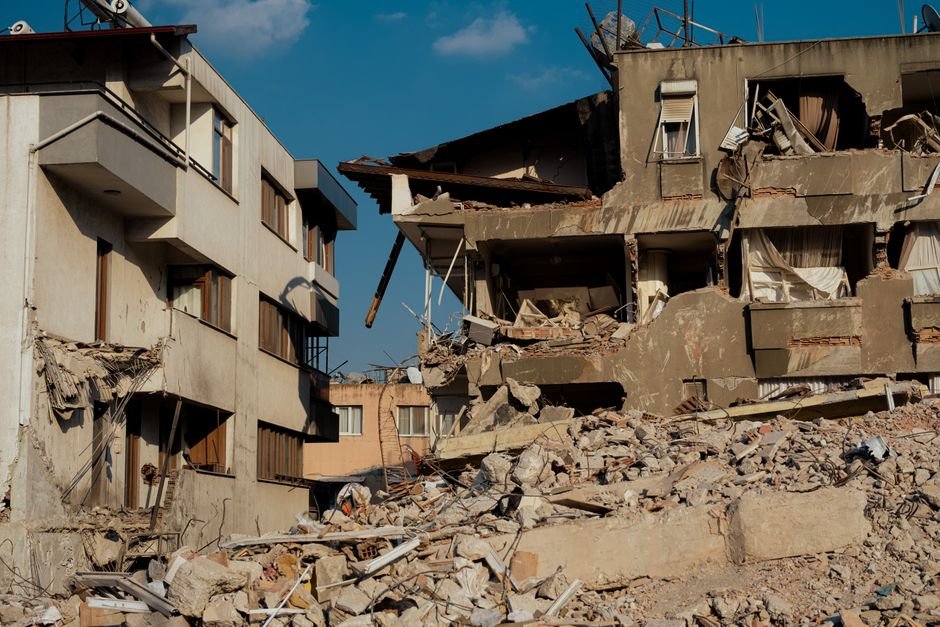 Delhi Building Collapse: Several Feared Trapped in Satya Niketan Incident Damaged buildings from earthquake in Antakya, Turkey. Structural collapse and debris.
