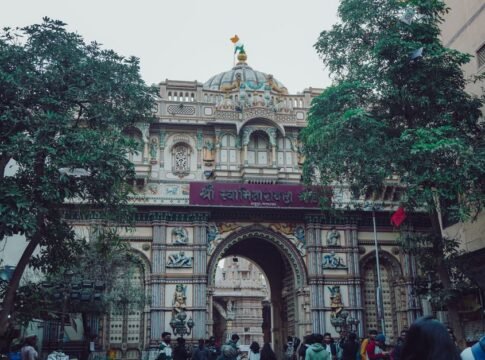 Detailed facade of a historic Indian temple adorned with intricate designs and cultural symbols. Detailed facade of a historic Indian temple adorned with intricate designs and cultural symbols.
