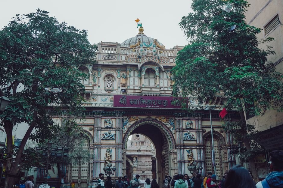 Ayodhya Ram Janmabhoomi Trust Shortlists Three for Inaugural CEO Position Detailed facade of a historic Indian temple adorned with intricate designs and cultural symbols.