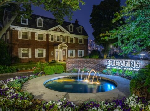 Illuminated view of Stevens Institute of Technology with a fountain at night, Hoboken, NJ. Illuminated view of Stevens Institute of Technology with a fountain at night, Hoboken, NJ.
