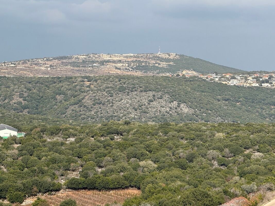 Israel Airstrikes Kill 9 in Southern Lebanon Village, Wound 13 Name: Marvin - the destroyed village in southern LebanonDescription: A view of the ruins of the village of Marviin in southern Lebanon - a Hezbollah outpost along with the neighboring Jabal Blat to t…