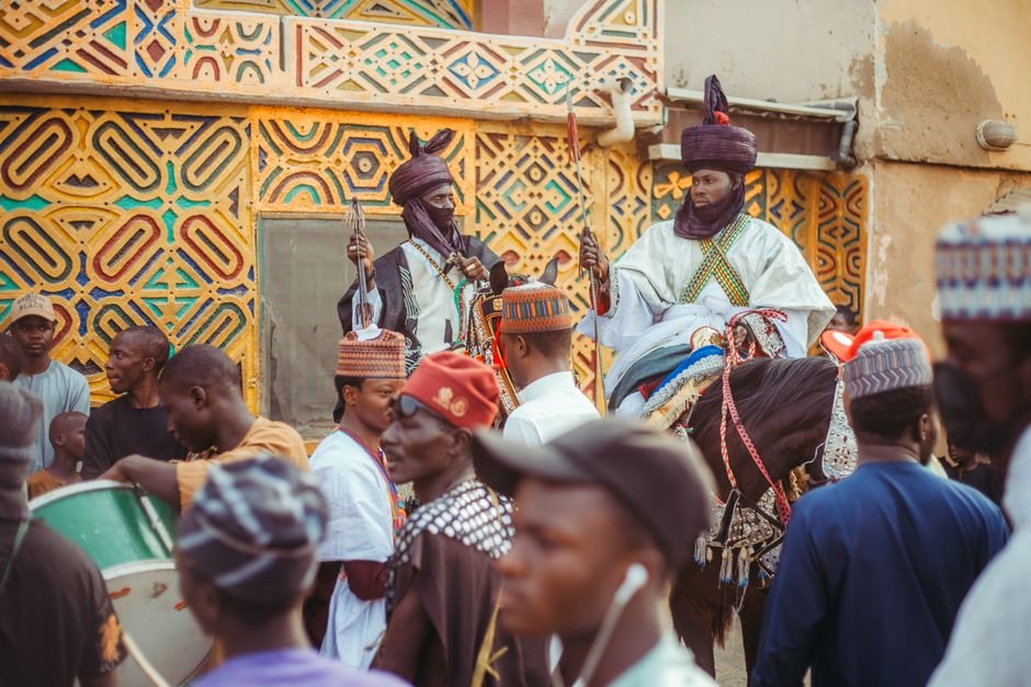 Ancient Mesopotamian Pottery Reveals Early Mathematical Thinking Through Floral Designs Vibrant street festival in Africa showcasing traditional attire and architecture.