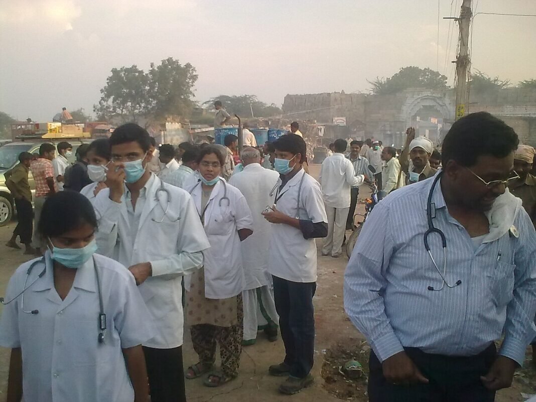 Andhra Pradesh: Woman Dies in Remote Village After Childbirth as Floods Impede Access to Healthcare this is a photograpf of a flood releif medical camp, conducted at alampur, mahaboobnagar, andhra pradesh, india.
