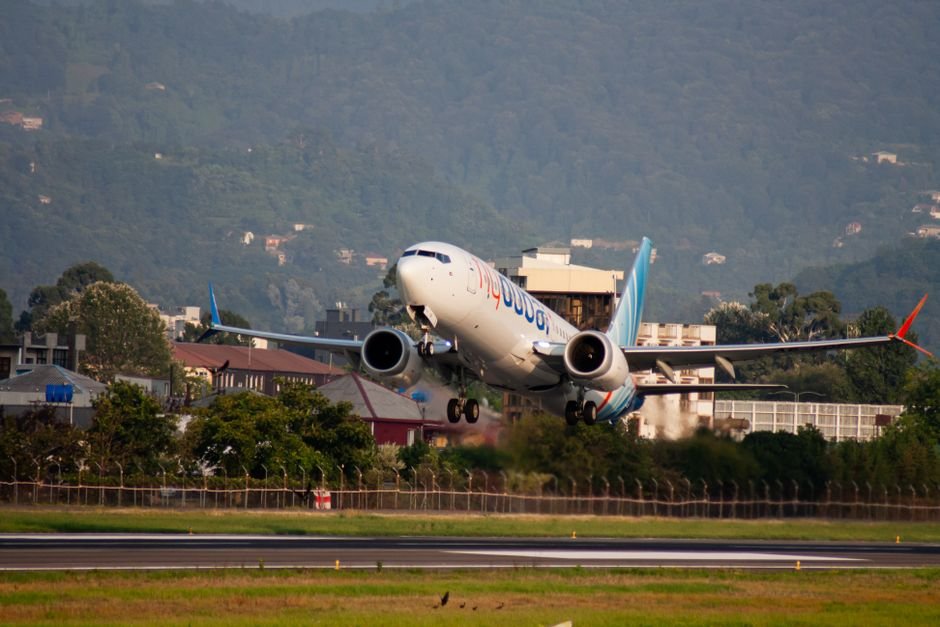 Flydubai Flight Crew Identity Remains Unspecified in Initial Reports A Flydubai Boeing 737 passenger jet takes off from Batumi airport with mountains in the background.