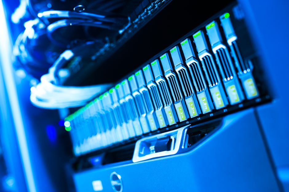 Anthropic’s Claude Haiku 5.5 Now Available on Amazon Bedrock and AWS A detailed view of a blue lit computer server rack in a data center showcasing technology and hardware.