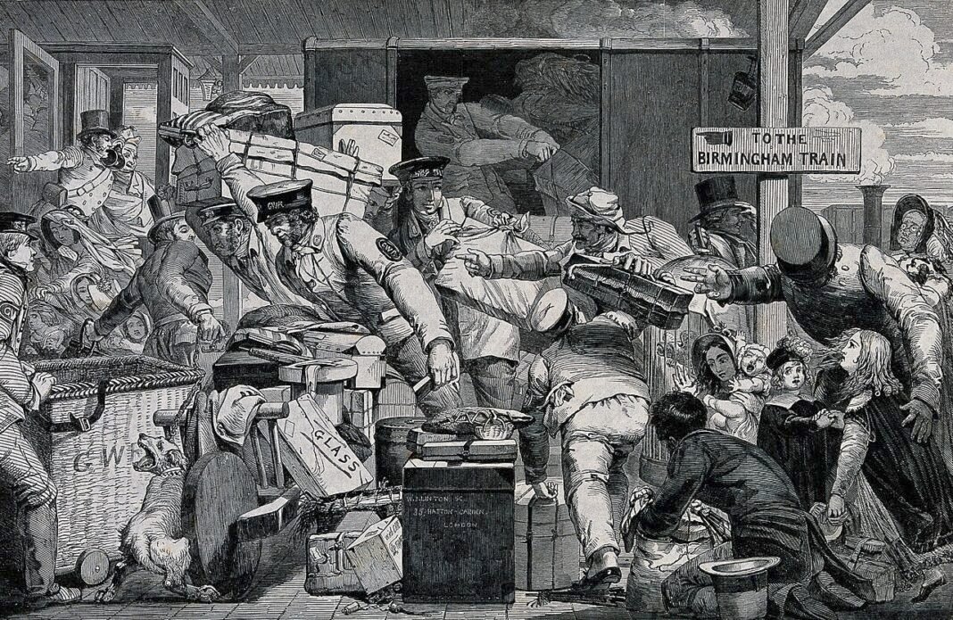 Uttar Pradesh Railway Porters See Income Plummet Amid Modernisation Efforts A railway station: a number of porters helping with people's luggage and giving some children directions. Wood engraving by W.J. Linton. Iconographic Collections Keywords: William James Linton