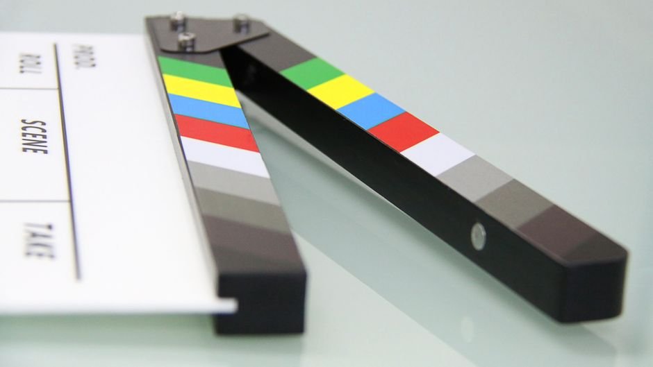 Studiocanal to Adapt ‘The Extremely Embarrassing Life of Lottie Brooks’ into Television Series Colorful clapper board on a white surface, used in filmmaking. Ideal for entertainment and movie themes.