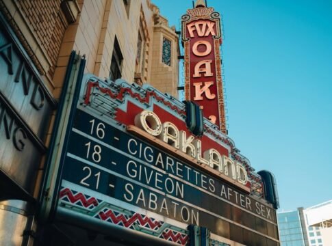 Exterior shot of the Fox Theater marquee in Oakland, California featuring upcoming events.