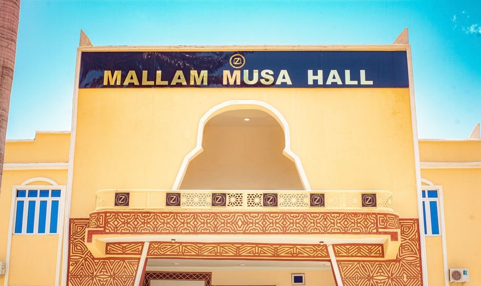 Jammu and Kashmir: Over 70 Congregations Across Region Deliver Common Sermon on Faith Front view of Mallam Musa Hall with intricate architectural details in bright lighting.