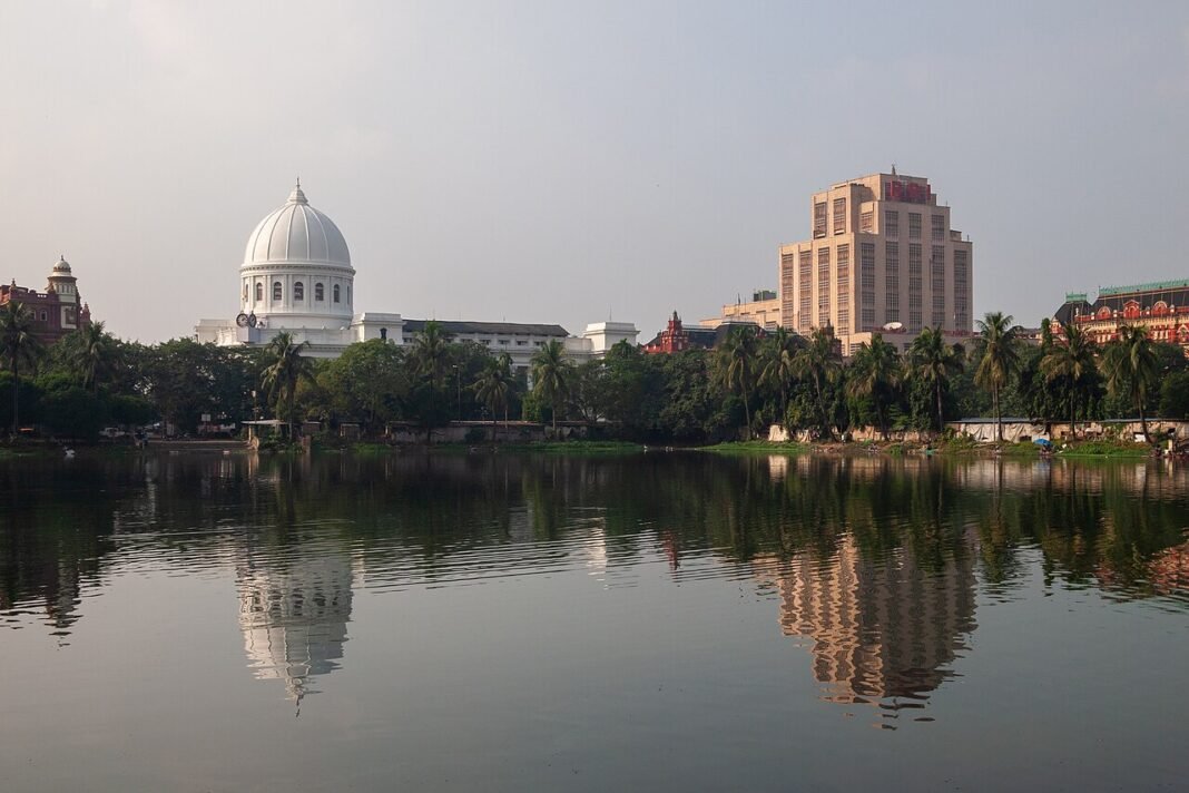 India’s Rupee Weakens Against US Dollar Ahead of RBI Policy Decision General Post Office and Reserve Bank of India buildings as seen from Lal Dighi (Red Pool), Kolkata, Calcutta, West Bengal, India.