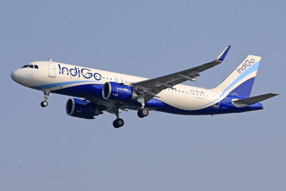 IndiGo Flight from Patna to Lucknow Makes Emergency Landing After Lightning Strike IndiGo commercial airline flying against a clear blue sky, signifying travel and aviation.