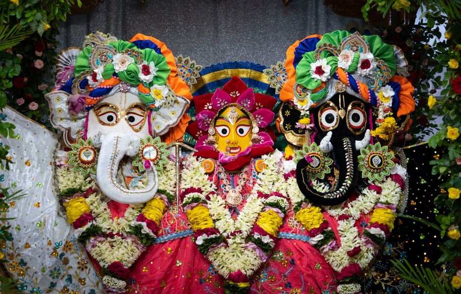 Himachal Pradesh: Kullu Dasehra Begins with Traditional Rath Procession Intricate and colorful Hindu religious decorations with vibrant floral garlands and deity representations.