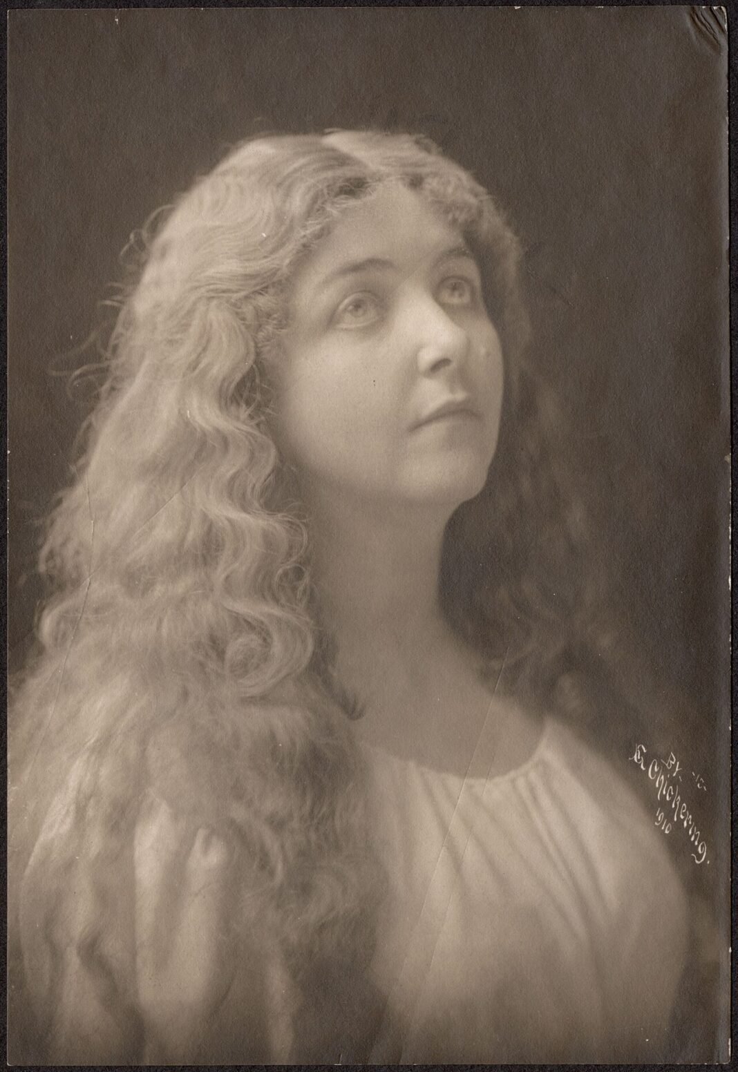 Celebrities Rally Behind Sally Rooney Amid UK Book Ban Controversy Title from item.; Alice Nielsen was an American Broadway performer and soprano. She also had her own opera company.; Date from item.; E. Chickering; Photograph of a woman with her hair hanging loose,…